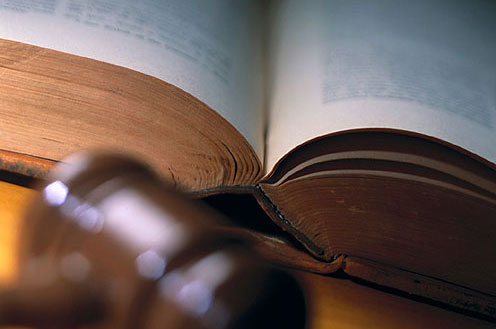 Image of legal reference book with gavel.